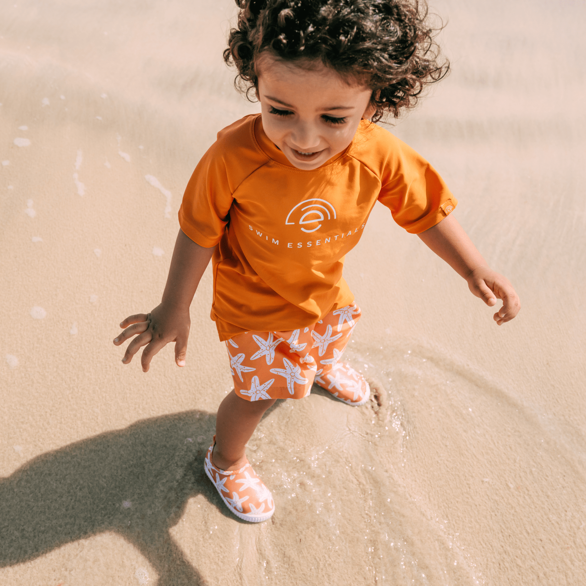 swim-shirt-orange-shortsleeve-swim-essentials-4